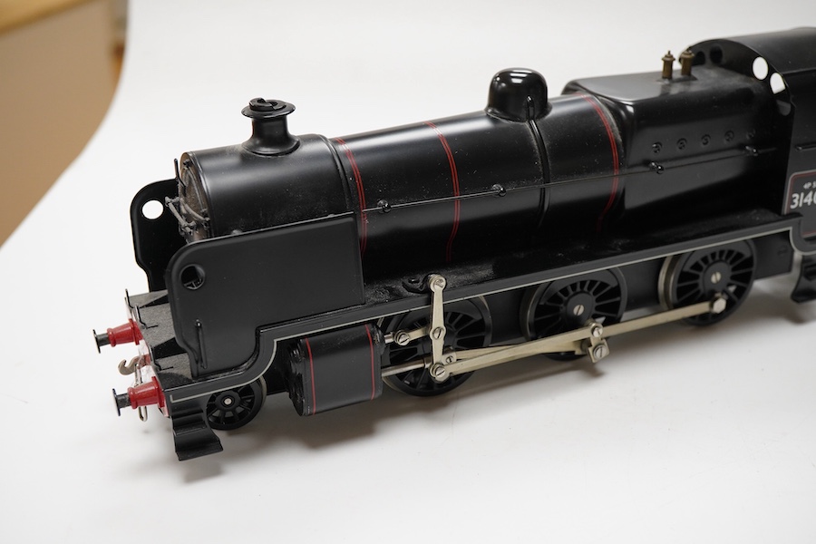 A boxed Bassett-Lowke by Corgi 0 gauge tinplate BR N class 2-6-0 tender locomotive, 31407, intended for two or three rail running (the pick ups for the centre rail and switch in the cab have been removed), (BL99004)